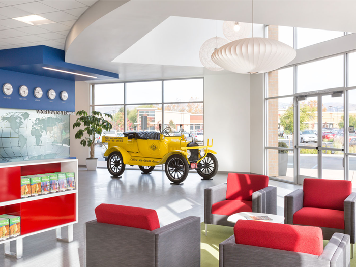AAA’s next-generation branches engage members with evocative pieces of company history; interactive kiosks; a clean, modern aesthetic; and an upbeat, all-American overhead music program.